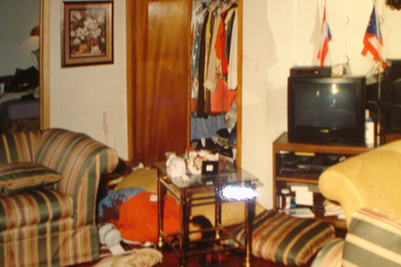 A crime scene photo of a ransacked apartment on New York Homicide